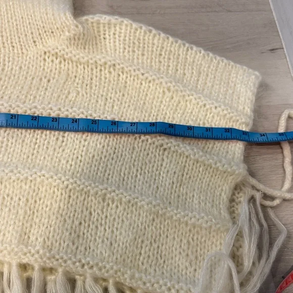 Elegant knitted Cream Knit Poncho with Fringe - Picture 11 of 12